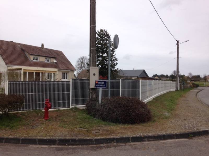 Pose et installation de clôtures avec lamelles occultantes autour de Louviers 27